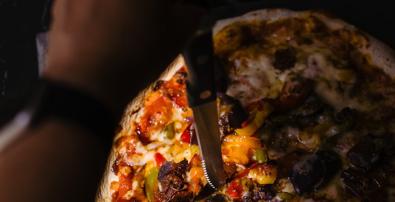 Pizza with colourful toppings