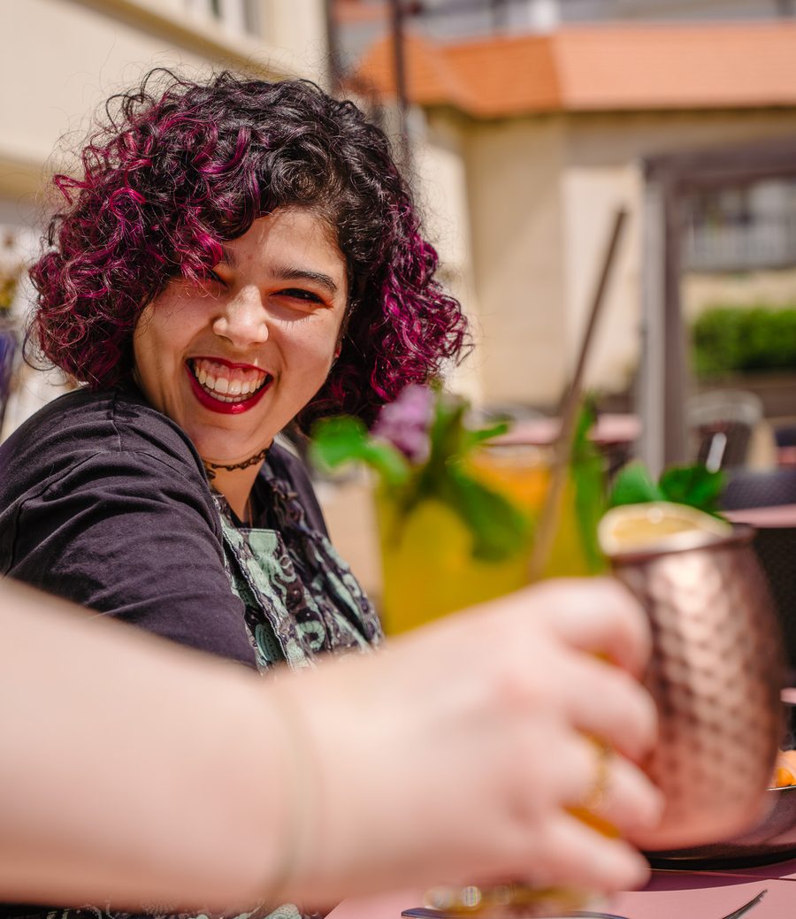 Guest smiling on the Dalu terrace