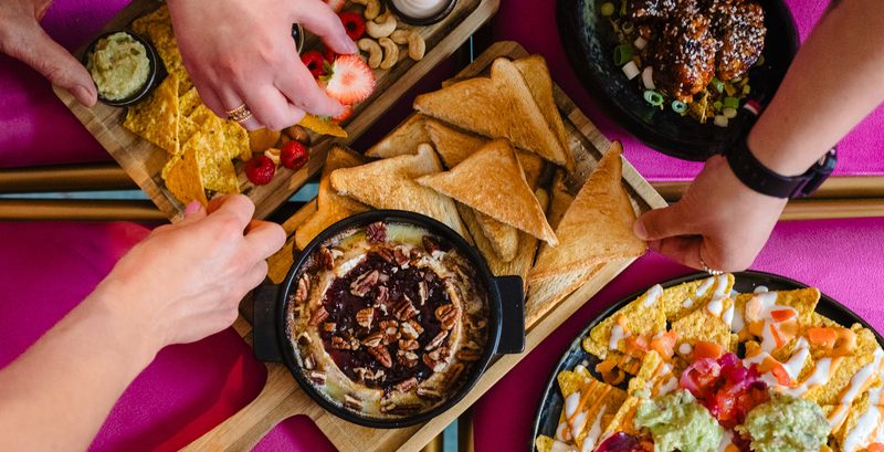 Shared plates and snacks on the table